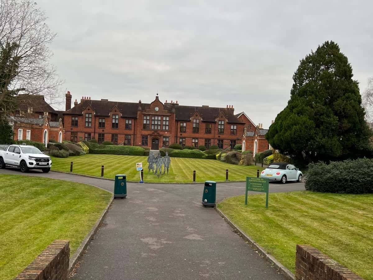 Lawns either side of a school driveway